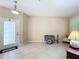 Neutral colored entryway with tile floors and a view of the front door at 452 Harbor Winds Ct, Winter Springs, FL 32708