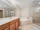 Bathroom with a large soaking tub and walk-in shower at 452 Harbor Winds Ct, Winter Springs, FL 32708