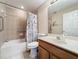 Clean bathroom with shower/tub combo and wood vanity at 452 Harbor Winds Ct, Winter Springs, FL 32708