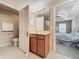 Bathroom with a single vanity and access to the bedroom at 452 Harbor Winds Ct, Winter Springs, FL 32708