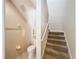 Upstairs bathroom with toilet and staircase access at 452 Harbor Winds Ct, Winter Springs, FL 32708