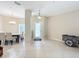 Spacious entryway with tile floors and views to the dining area and front door at 452 Harbor Winds Ct, Winter Springs, FL 32708