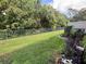Backyard with grassy area and privacy fence at 452 Harbor Winds Ct, Winter Springs, FL 32708