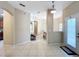 Bright and spacious entryway with tile floors and views into the living and dining areas at 452 Harbor Winds Ct, Winter Springs, FL 32708
