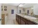 Elegant bathroom with double sinks and granite countertops at 3349 Rodrick Cir, Orlando, FL 32824