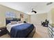 Spacious bedroom with a ceiling fan and large windows at 3349 Rodrick Cir, Orlando, FL 32824