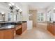 Spacious bathroom with a soaking tub, double vanity, and shower at 9106 Panzani Pl, Windermere, FL 34786