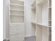 Spacious walk in closet, built-in shelving, and drawers at 9106 Panzani Pl, Windermere, FL 34786