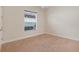 Bright bedroom with large window and carpeted floors at 9106 Panzani Pl, Windermere, FL 34786