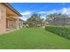 Spacious backyard showcasing a well-manicured lawn at 9106 Panzani Pl, Windermere, FL 34786