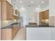 Spacious kitchen with granite countertops and stainless steel appliances at 9106 Panzani Pl, Windermere, FL 34786