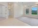 Spacious living area with large windows and a view of the backyard at 9106 Panzani Pl, Windermere, FL 34786