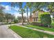 Two story house on tree lined street with palm trees at 9106 Panzani Pl, Windermere, FL 34786