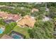 Aerial view of a house with a large backyard, pool, and lush landscaping at 9106 Panzani Pl, Windermere, FL 34786