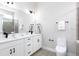 Double vanity bathroom with modern fixtures and a shower/tub combo at 2120 Broome St, Kissimmee, FL 34743
