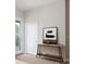 Elegant hallway with modern art and access to other rooms at 2120 Broome St, Kissimmee, FL 34743