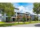 Modern townhouses with attractive landscaping and balconies at 2120 Broome St, Kissimmee, FL 34743