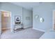 Bright bedroom featuring a comfortable sitting area and large closet at 2120 Broome St, Kissimmee, FL 34743