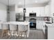 Modern kitchen with stainless steel appliances and island at 2120 Broome St, Kissimmee, FL 34743