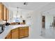 Kitchen with ample counter space and access to laundry at 148 Merida Dr, Kissimmee, FL 34743
