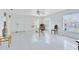 Spacious living room with tile floors and ceiling fan at 148 Merida Dr, Kissimmee, FL 34743