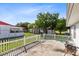Private backyard with a patio, perfect for outdoor entertaining at 148 Merida Dr, Kissimmee, FL 34743