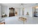 Living room with tiled floors and built-in shelving at 148 Merida Dr, Kissimmee, FL 34743