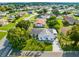 Aerial view showcasing the home's curb appeal and neighborhood at 148 Merida Dr, Kissimmee, FL 34743