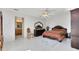 Spacious bedroom with ensuite bathroom access and ample closet space at 148 Merida Dr, Kissimmee, FL 34743