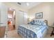 Bedroom with access to private office and carpet flooring at 4907 W Fountainwood Dr, St Cloud, FL 34772