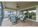 Cozy screened porch with patio furniture at 4907 W Fountainwood Dr, St Cloud, FL 34772