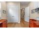 Home office with hardwood floors and views to hallway at 4907 W Fountainwood Dr, St Cloud, FL 34772