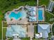 Aerial view of a community pool and other recreational facilities at 4907 W Fountainwood Dr, St Cloud, FL 34772