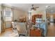 Relaxing living room with hardwood floors and ample seating at 4907 W Fountainwood Dr, St Cloud, FL 34772