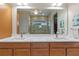 Double vanity bathroom with quartz countertops and modern fixtures at 4907 W Fountainwood Dr, St Cloud, FL 34772