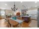Open concept kitchen with island and hardwood floors at 4907 W Fountainwood Dr, St Cloud, FL 34772