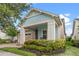 House exterior with light blue accents and landscaping at 4907 W Fountainwood Dr, Saint Cloud, FL 34772