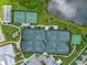 Aerial view of tennis and pickleball courts near a lake at 4907 W Fountainwood Dr, St Cloud, FL 34772