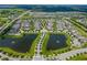 Aerial view of a residential community with multiple lakes at 4907 W Fountainwood Dr, St Cloud, FL 34772
