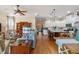 Bright living room with hardwood floors and view into kitchen at 4907 W Fountainwood Dr, St Cloud, FL 34772