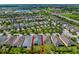 Aerial view showing home's location in a well-maintained community at 4907 W Fountainwood Dr, St Cloud, FL 34772