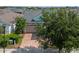 Aerial view of a house with a driveway and landscaping at 4907 W Fountainwood Dr, St Cloud, FL 34772