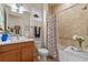 Well-lit bathroom with walk-in shower and updated vanity at 4907 W Fountainwood Dr, St Cloud, FL 34772