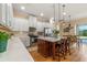 Bright kitchen featuring stainless steel appliances and an island with seating at 4907 W Fountainwood Dr, St Cloud, FL 34772