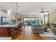 Open living area with hardwood floors and view of backyard at 4907 W Fountainwood Dr, St Cloud, FL 34772