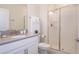 Clean bathroom with shower, toilet and vanity with gray countertop at 4804 Memories Ln, Kissimmee, FL 34746