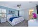 Spacious bedroom with king-size bed and ensuite bathroom access at 4804 Memories Ln, Kissimmee, FL 34746