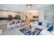 Modern kitchen with island, stainless steel appliances, and white cabinetry at 4804 Memories Ln, Kissimmee, FL 34746