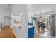 Modern kitchen with blue cabinets, stainless steel appliances, and a breakfast nook at 8692 Vesta Ter, Orlando, FL 32825