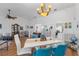Bright dining room with hardwood floors and modern chandelier at 8692 Vesta Ter, Orlando, FL 32825